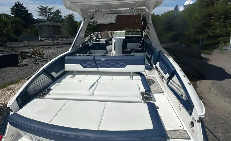 Slide: The Image of 2022 Cobalt A29 boat interior with spacious seating and modern design. - 12