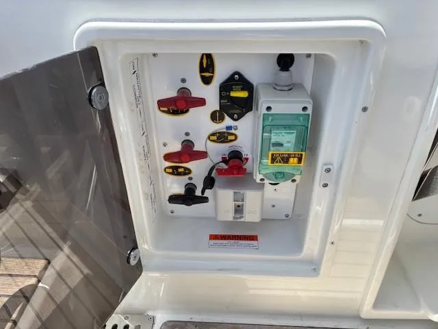 Slide: The Image of Electrical control panel on a 2023 Jeanneau Leader 9.0 WA boat. - 14