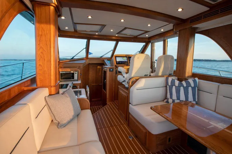 Slide: The Image of Luxurious interior of 2026 Sabre 43 Salon Express yacht with elegant wood finishes. - 13