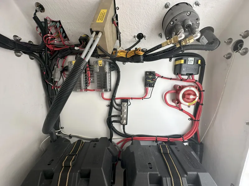 Slide: The Image of Electrical wiring setup in a Reflex Gladiator 2400, 2026 model, showcasing organized cables and components. - 34