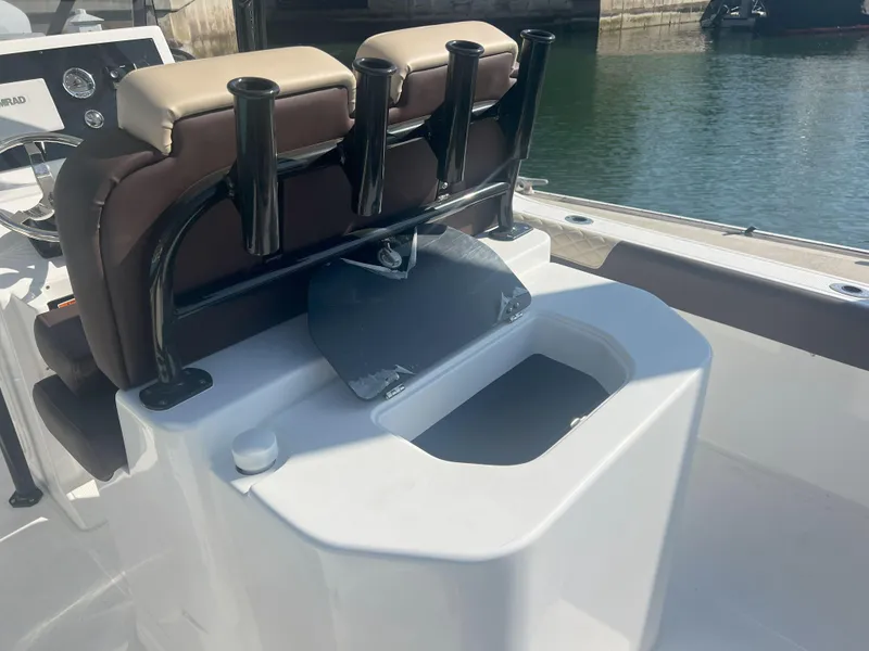 Slide: The Image of Boat seating area with rod holders on a 2026 Reflex Gladiator 2400. - 9