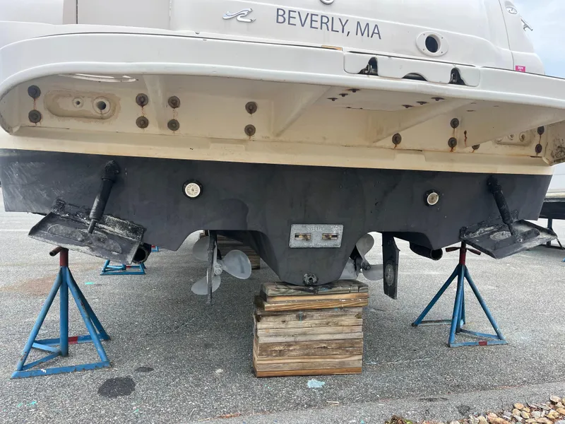 Slide: The Image of 2000 Sea Ray 340 Sundancer boat on stands, rear view, Beverly, MA. - 13