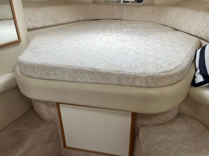 Slide: The Image of Interior cabin of 2000 Sea Ray 340 Sundancer with a comfortable bed. - 21