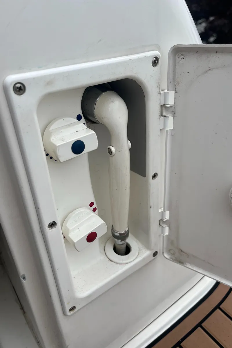 Slide: The Image of Water control panel on a 2000 Sea Ray 340 Sundancer boat. - 35