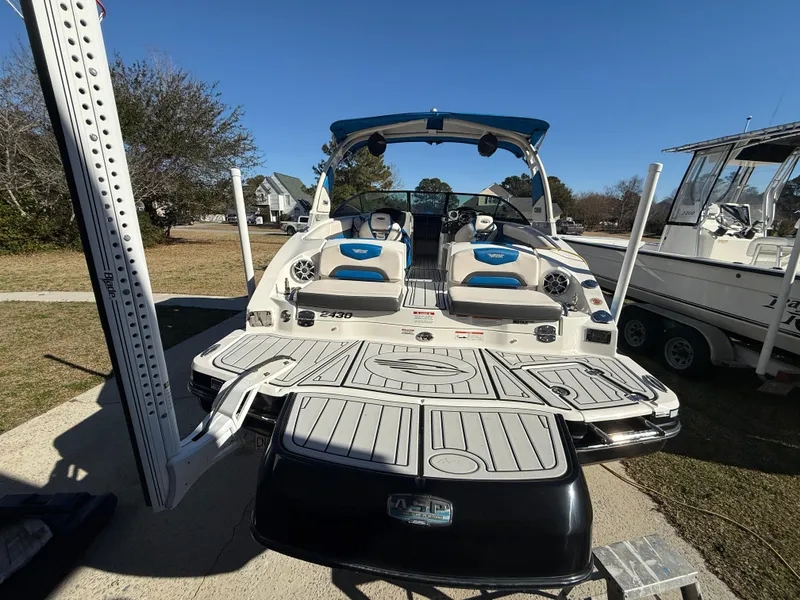 Slide: The Image of 2017 Chaparral Vortex 2430 VRX boat with spacious seating and sleek design. - 16