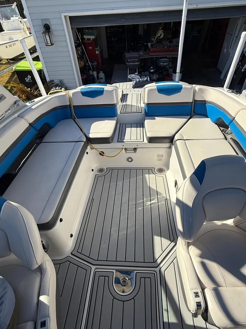 Slide: The Image of 2017 Chaparral Vortex 2430 VRX boat interior with spacious seating and modern design. - 17