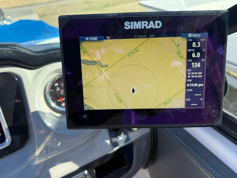 Slide: The Image of Simrad navigation display on 2017 Chaparral Vortex 2430 VRX boat dashboard. - 7