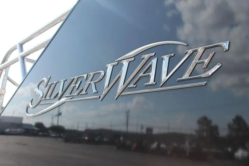 Slide: The Image of Silver Wave 2410 SW5 JS 2021 logo on a sleek boat surface. - 15