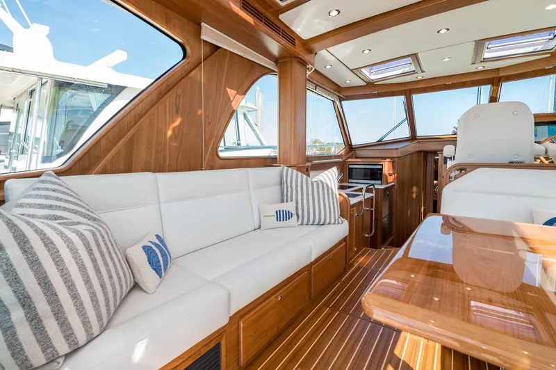 Slide: The Image of Luxurious interior of 2025 Sabre 43 Salon Express yacht with elegant wood finish. - 25