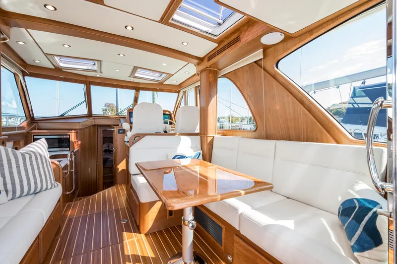 Slide: The Image of Luxurious interior of 2025 Sabre 43 Salon Express yacht with elegant wood finish. - 26