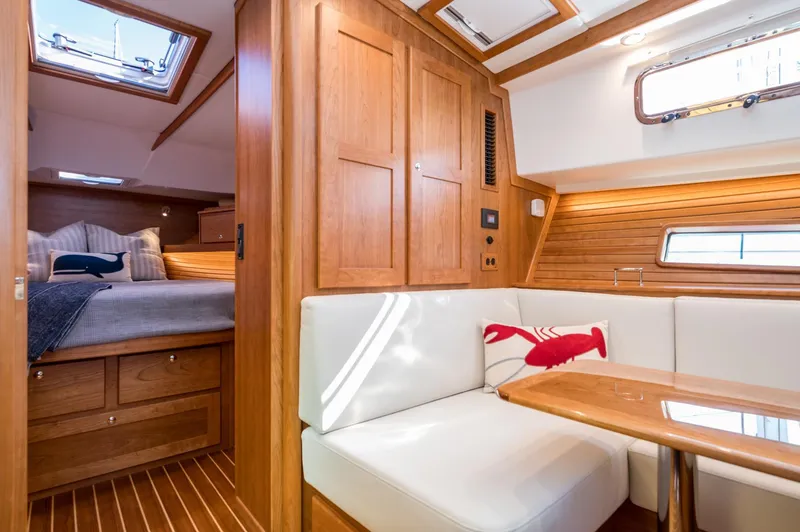 Slide: The Image of Luxurious interior of 2025 Sabre 43 Salon Express yacht with cozy seating and elegant wood finish. - 45