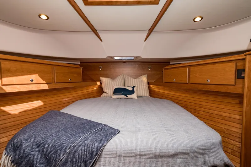 Slide: The Image of Luxurious cabin interior of 2025 Sabre 43 Salon Express yacht with cozy bedding. - 46