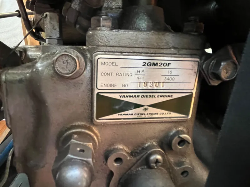 Slide: The Image of Close-up of a Yanmar 2GM20F diesel engine label on a 1992 Hunter 30-2. - 12