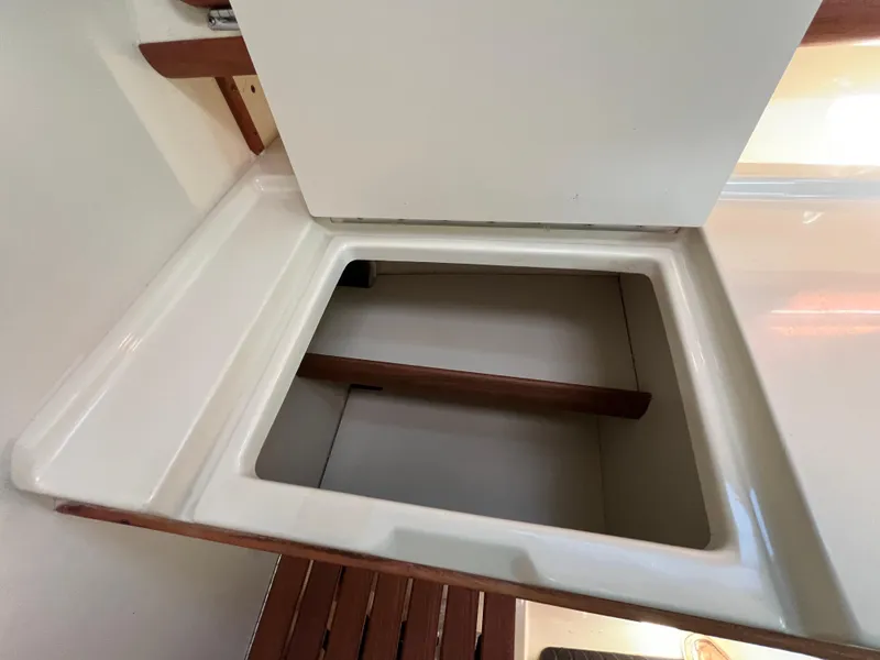 Slide: The Image of Open storage compartment on a 1992 Hunter 30-2 sailboat interior. - 14
