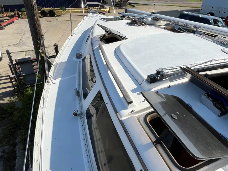 Slide: The Image of Hunter 30-2 sailboat deck, 1992 model, featuring open hatch and rigging details. - 22
