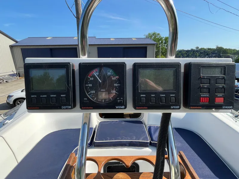 Slide: The Image of Control panel of a 1992 Hunter 30-2 sailboat with depth, wind, and speed instruments. - 19