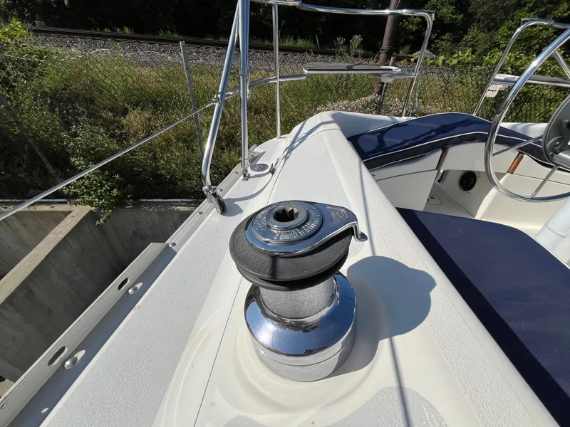 Slide: The Image of Deck view of a 1992 Hunter 30-2 sailboat with winch and railing. - 27
