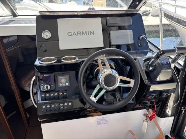 Slide: The Image of Helm of 2020 Jeanneau NC 1095 Fly with Garmin navigation system. - 16