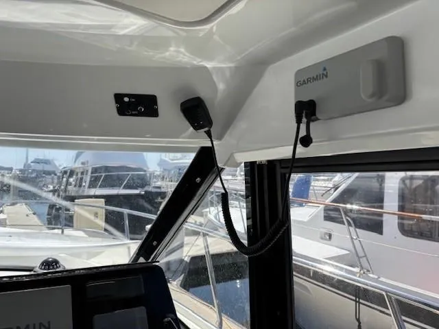 Slide: The Image of Interior view of 2020 Jeanneau NC 1095 Fly boat with Garmin equipment. - 18