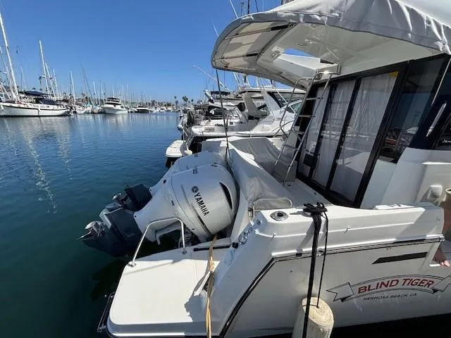 Slide: The Image of 2020 Jeanneau NC 1095 Fly yacht docked with Yamaha outboard motor. - 27