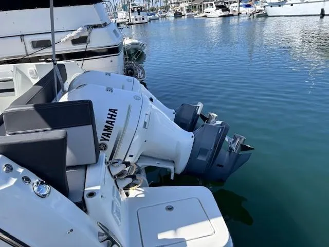 Slide: The Image of 2020 Jeanneau NC 1095 Fly with Yamaha outboard engines docked in marina. - 33