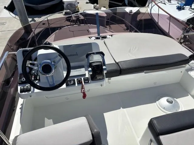 Slide: The Image of Helm of 2020 Jeanneau NC 1095 Fly with steering wheel and controls. - 43