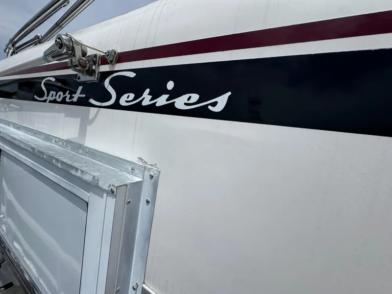 Slide: The Image of 1993 Gibson 37 Sport Series boat, close-up of exterior detailing and logo. - 18