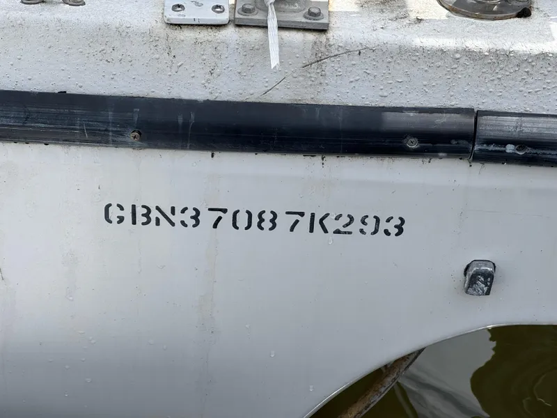Slide: The Image of 1993 Gibson 37 Sport Series boat hull with identification number GBN37087K293. - 20