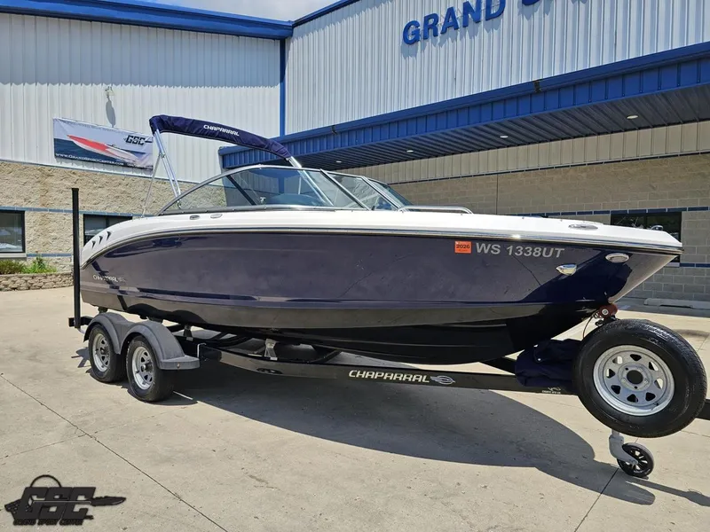 Slide: The Image of 2020 Chaparral 21 SSi boat on trailer outside Grand Sport Center. - 12