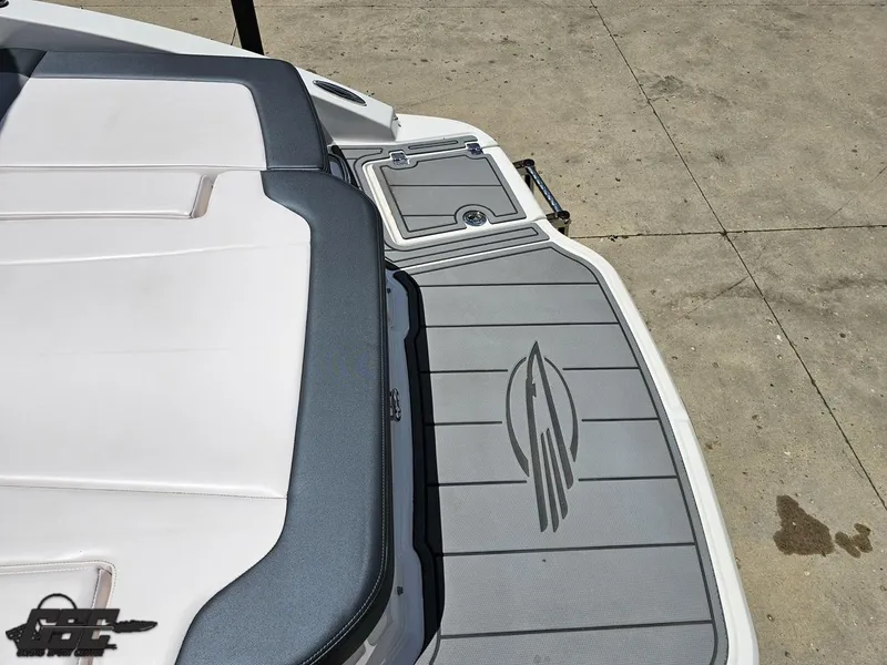 Slide: The Image of 2020 Chaparral 21 SSi boat deck with sleek gray and white design. - 44