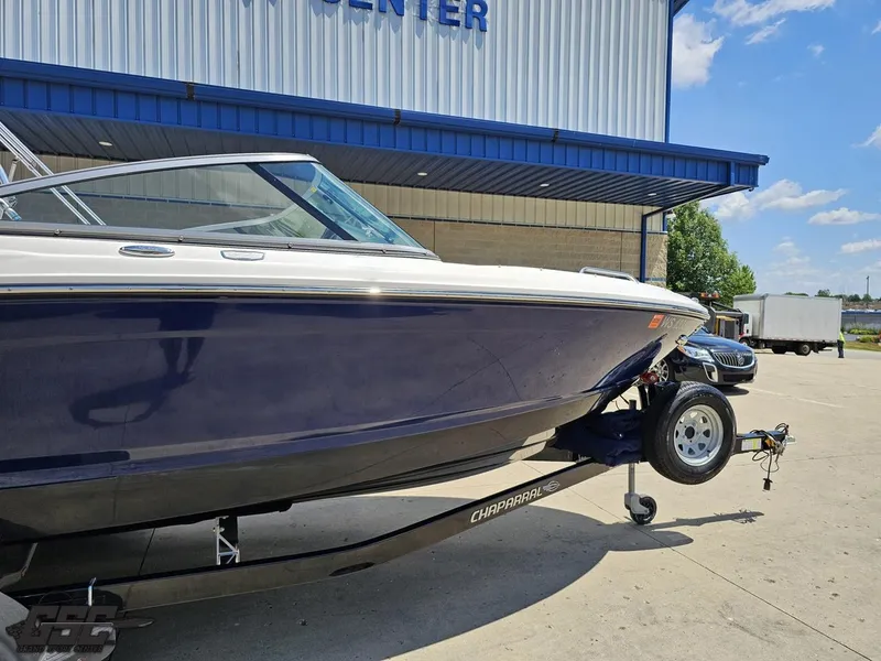 Slide: The Image of 2020 Chaparral 21 SSi boat on trailer outside a service center. - 5