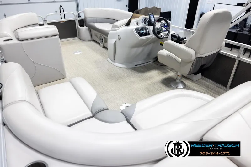 Slide: The Image of Luxurious interior of 2019 Avalon GS CR pontoon boat with plush seating and modern dashboard. - 11