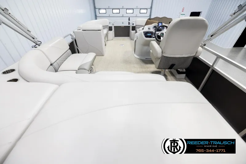 Slide: The Image of Interior of a 2019 Avalon GS CR boat with plush seating and modern controls. - 16