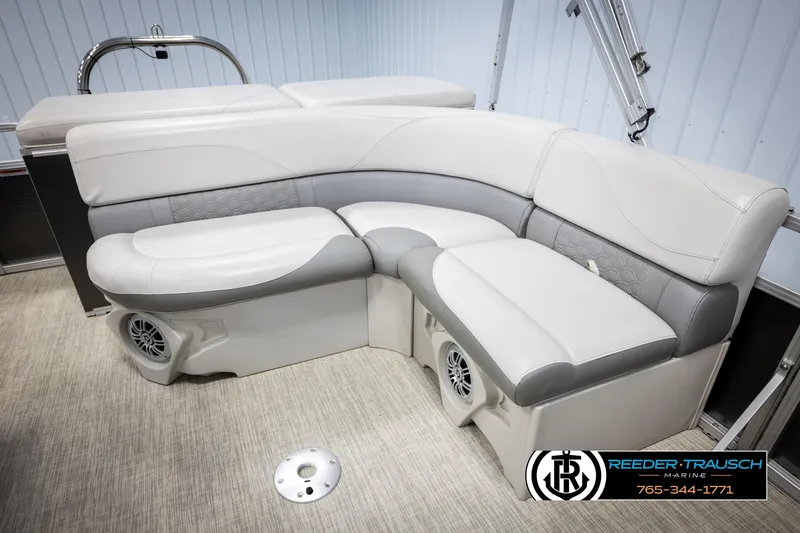 Slide: The Image of Luxurious seating on 2019 Avalon GS CR boat, featuring elegant gray and white upholstery. - 23
