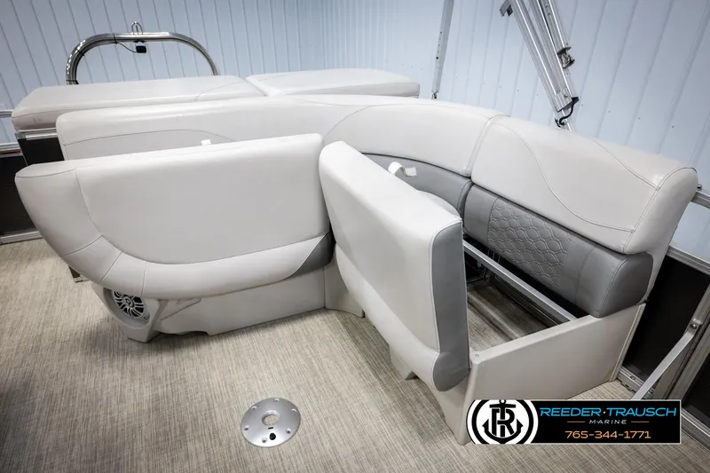 Slide: The Image of 2019 Avalon GS CR boat interior with gray seating and storage compartment. - 25