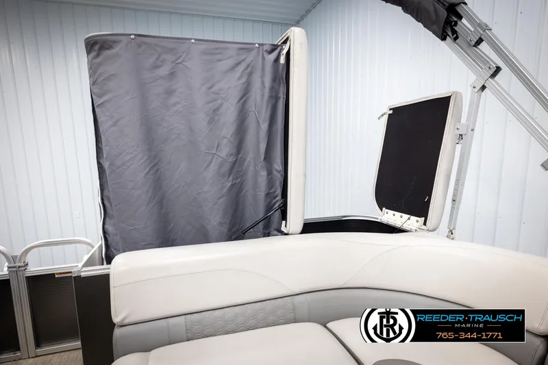 Slide: The Image of 2019 Avalon GS CR boat interior with gray privacy curtain and seating. - 27