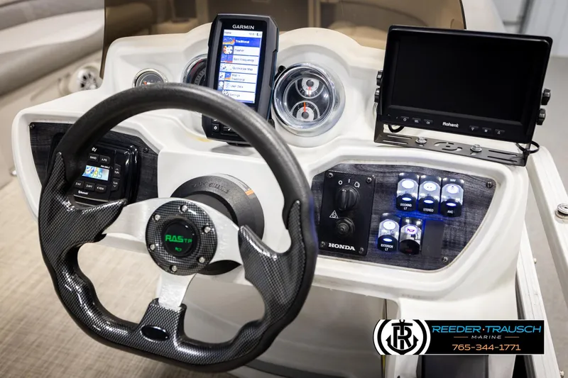Slide: The Image of Steering console of 2019 Avalon GS CR boat with Garmin GPS and control panel. - 28