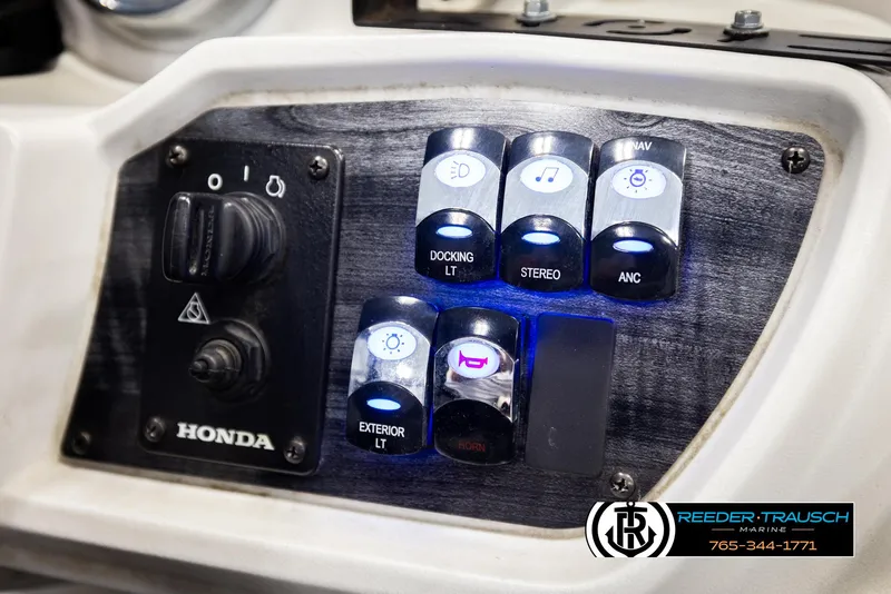 Slide: The Image of Control panel of a 2019 Avalon GS CR boat with illuminated switches and Honda branding. - 39