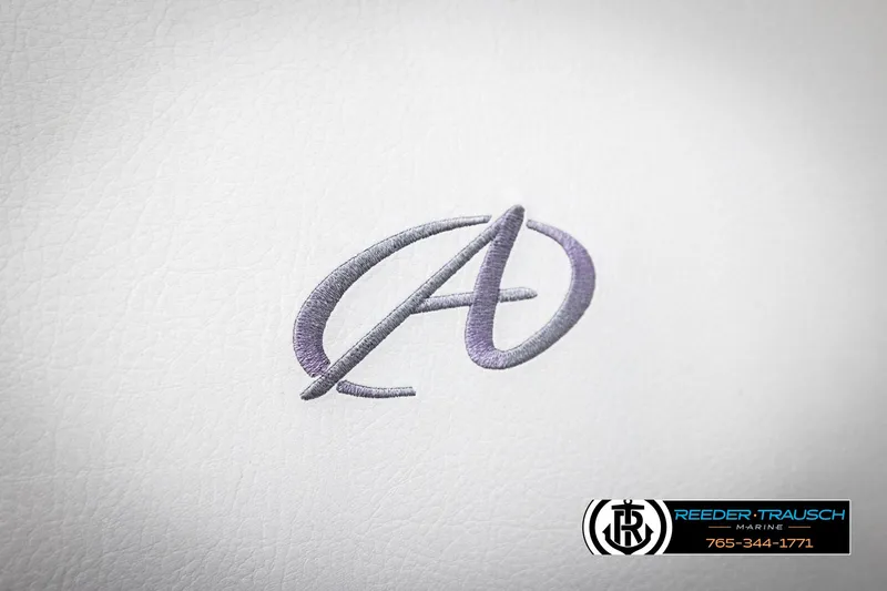 Slide: The Image of Embroidered Avalon logo on white leather, 2019 GS CR model, Reeder-Trausch Marine branding. - 44