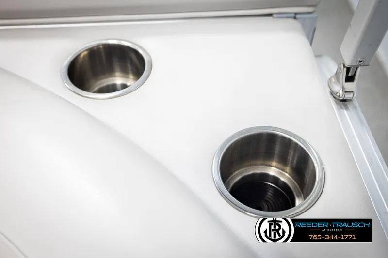 Slide: The Image of 2019 Avalon GS CR boat interior with dual stainless steel cup holders. - 45