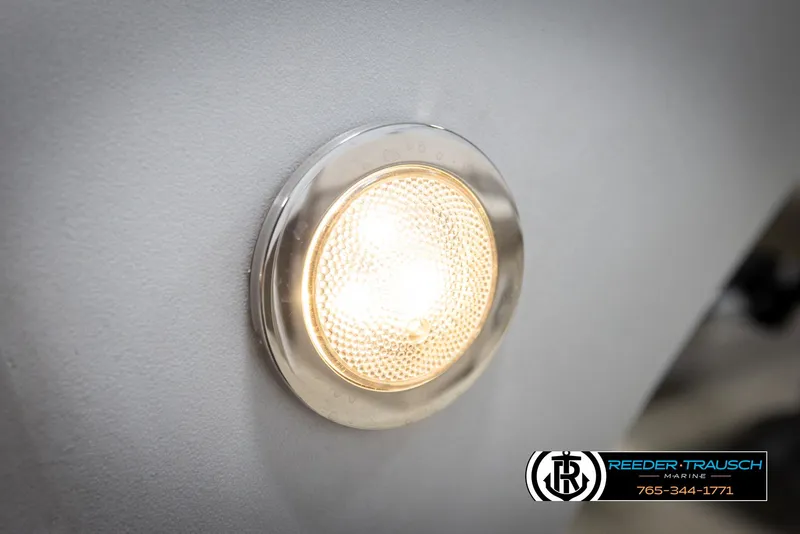 Slide: The Image of Close-up of a 2019 Avalon GS CR boat light with Reeder-Trausch Marine logo. - 47