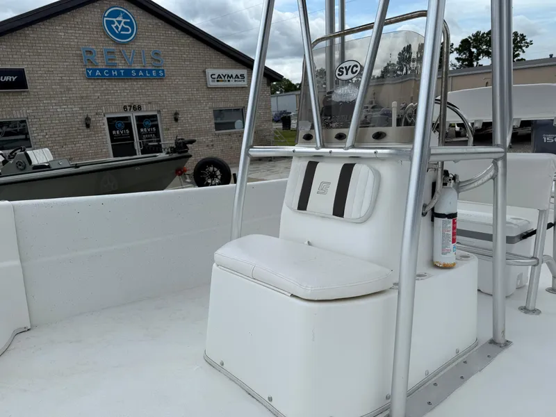 Slide: The Image of 2011 Carolina Skiff 218 DLV boat interior at Revis Yacht Sales dealership. - 12