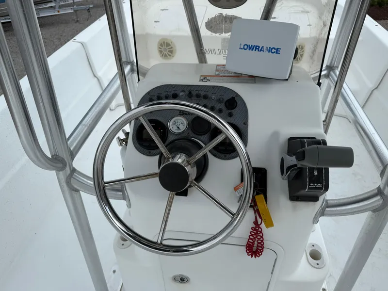 Slide: The Image of Steering console of a 2011 Carolina Skiff 218 DLV with Lowrance equipment. - 16