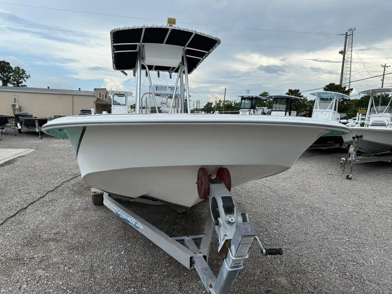 Slide: The Image of 2011 Carolina Skiff 218 DLV boat on trailer, outdoor display. - 9