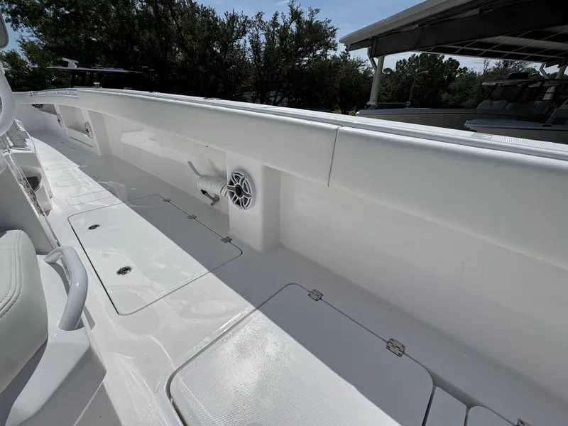 Slide: The Image of 2026 Invincible 38 Catamaran interior with sleek white design and modern features. - 35