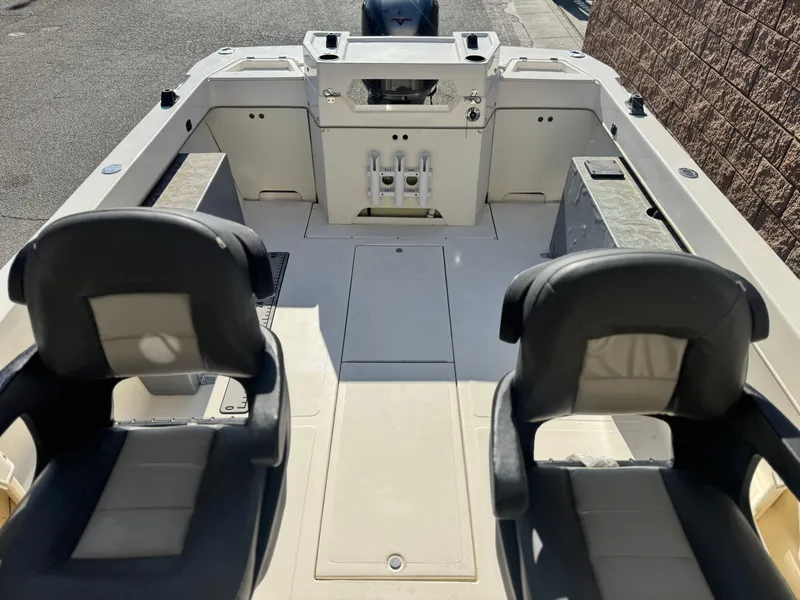 Slide: The Image of 2020 Arima Sea Chaser 19 Yellowtail Edition boat interior with seating and storage compartments. - 10