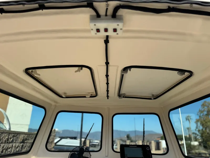 Slide: The Image of Interior view of 2020 Arima Sea Chaser 19 Yellowtail Edition boat cabin ceiling. - 12