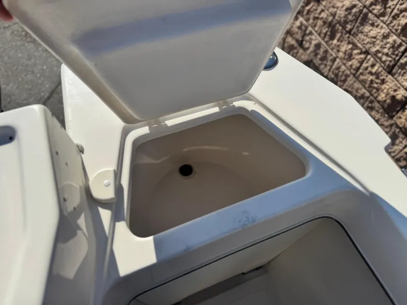 Slide: The Image of Open storage compartment on 2020 Arima Sea Chaser 19 Yellowtail Edition boat. - 15