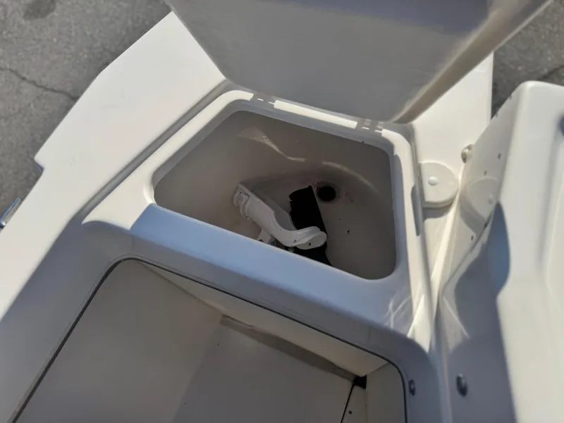 Slide: The Image of Open storage compartment on 2020 Arima Sea Chaser 19 Yellowtail Edition boat. - 16