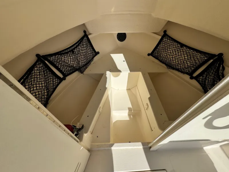 Slide: The Image of Interior of 2020 Arima Sea Chaser 19 Yellowtail Edition boat with storage nets. - 23